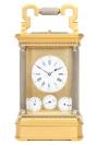 A French gilt and silvered Anglaise striking and alarm travel clock with calendar, circa 1870.